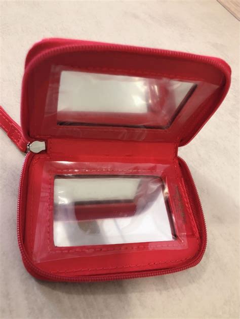 ysl zip mirror